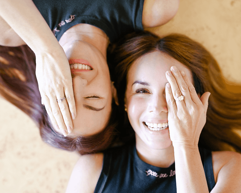 Two women smiling